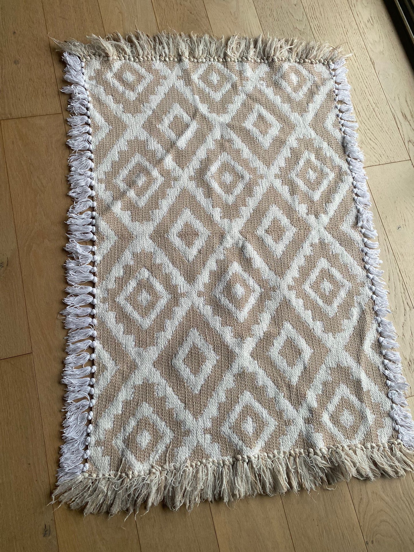 Tapis beige "douceur et simplicité"